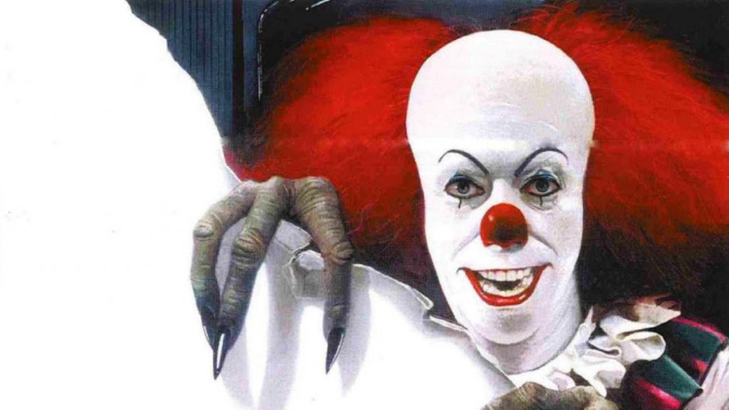 Tim Curry as Pennywise in IT